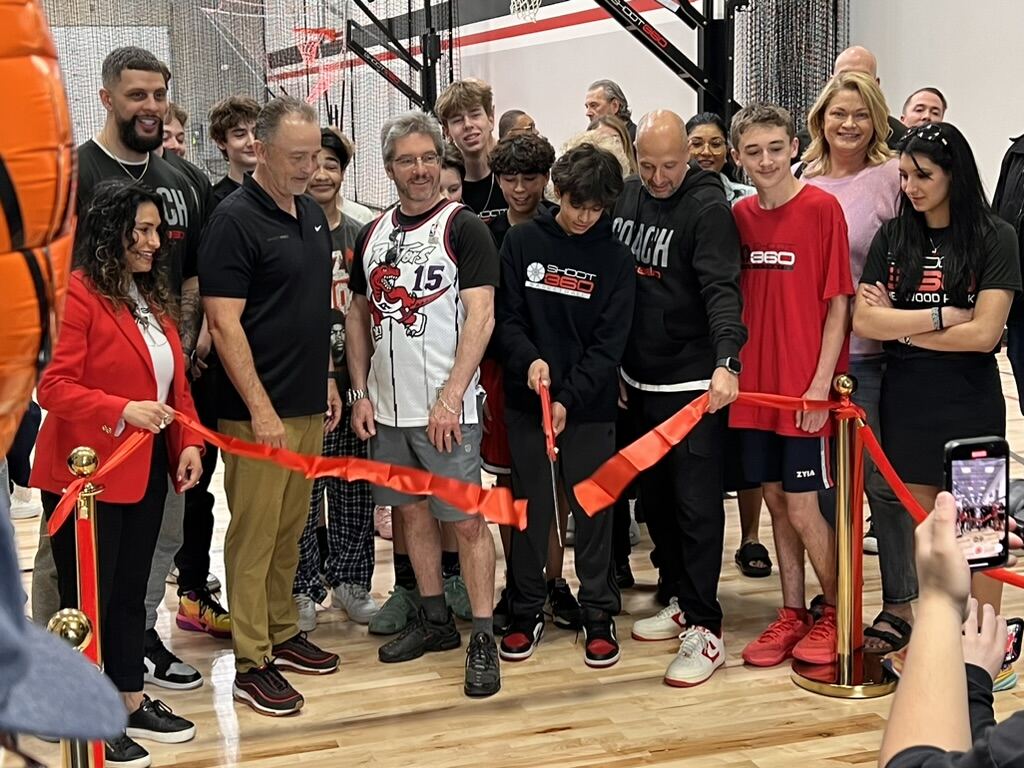 Ribbon cutting. Another location open for business.
